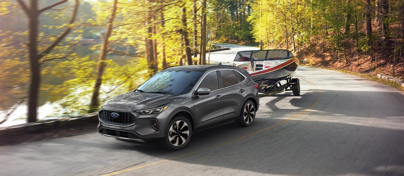 Ford Escape 2025 - Compact SUV with towing capacity up to 3500 lbs, perfect for towing a small boat.